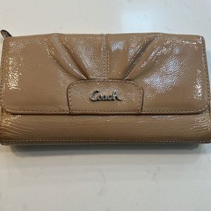 Cream patent leather coach wallet